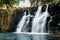 Scenic cascade waterfall with amazing rocks in Mauritius