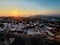 Scenic cityscape from the rooftops in Greece at sunset