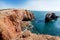 Scenic cliffs and seaside of Portugal. Ocean waves on peaceful and sunny area of Algarve