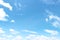 Scenic clouds on vast bright blue sky on vast background and copy space  images