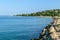 Scenic coastline ocean view along seawall of tropical Caribbean island.