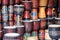 Scenic colorful rows of wooden djembe drums at souvenir shop