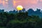 Scenic colorful sunset at tropical river rainforest