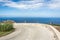 Scenic curvy coastal road with view of the ocean