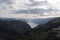 Scenic and dramatic panorama of Lysefjord Lysefjorden fjord canyon landscape in Norway in summer