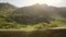 Scenic Drive Through The Lush Green Mountain Terrain During Sunset In Snowdonia National Park In Wa