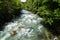 scenic emerald-green river Passer in Merano in North Italy