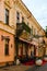 Scenic facade of medieval building with closed street cafe. Olga Kobylyanska Street