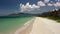 Scenic fly over a tropical white sand beach island in Asia on summer day.