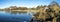 Scenic frozen coast of Hafrsfjord fjord at Sword in Rock monument and a small family park, Stavanger