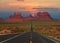 Scenic highway in Monument Valley Tribal Park in Arizona-Utah border, U.S.A. at sunset.