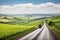 scenic highway with view of rolling hills and farmland, with a tractor in the distance