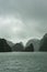 Scenic karst islands of Halong Bay on mist