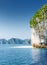 Scenic karst tower-isle with white wild beach in the Ha Long Bay