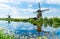 Scenic Kinderdijk area of ponds, fields and windmills.