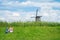 Scenic Kinderdijk area of ponds, fields and windmills.