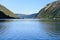 scenic lake Achensee in Austria, green mountains rises above the calm expanse of water, concept of the beauty of nature, vacation