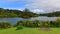 Scenic Lake Mangamahoe and its lush bank in New Zealand