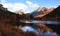 Scenic lake near Marble, Colorado with mountain reflections under evening sun light