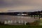 Scenic landscape of the bay with city lights at Pioneer Orchard Park, Steilacoom, WA.