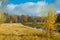 Scenic landscape with calm river and green vegetation.