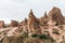 scenic landscape with eroded bizarre rock formations in famous cappadocia,