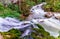 Scenic landscape of Isichenko waterfall in Kurdzhips river gorge in Caucasus mountains by Mezmai village at summer, Russia