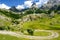 Scenic landscape of mountain valley in european Alps. Stunning view of mountains and valleys in sunset light