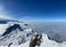 Scenic landscape of mountains draped in a blanket of clouds. Santis, Switzerland.