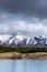 A scenic landscape of New Zealand Southern Alps and Lake Pukaki