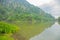 Scenic landscape and perspective view of rainforest national park shows beautiful greeny lake and cloud with water reflection