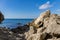 Scenic landscape with rocky coast of the Black Sea in surroundings of Sudak, Crimean peninsula. Cape Alchak in Sudak