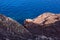 Scenic lava rock cliff  in the Linosa island. Sicily