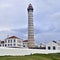Scenic Leca Lighthouse against the cloudy sky in Portugal