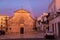 Scenic Madonna della Greca Church and rainbow in Locorotondo, Italy