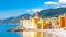 Scenic Mediterranean riviera coast. Panoramic view of Camogli town in Liguria, Italy. Basilica of Santa Maria Assunta and colorful