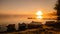 Scenic misty Sunrise over lake with large orange Sun, coast line with parked small boats, water bridge, reflection. Copy space