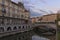 Scenic morning landscape of Ljubljana. Panoramic view of embankment of Ljubljanica River with Triple Bridge