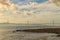 Scenic morning landscape of Tagus river and April 25 bridge with Catholic monument of Christ the King Almada at the background.