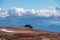 Scenic morning view after sunrise on summit cross of mountain peak Grosser Sauofen, Saualpe, Lavanttal Alps, Austria