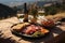 Scenic mountain picnic with a spread of wine, prosciutto, and jamon