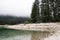 Scenic mystical cloudy lago di predil, italy