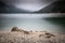 Scenic mystical cloudy lago di predil, italy