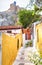 Scenic narrow street with old houses in Anafiotika, Plaka district, Athens, Greece