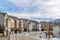 Scenic neighborhood in winter with townhouses overlooking snowy mountain peak