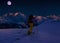 Scenic night backcountry ski panorama sunset landscape of Crans-Montana range in Swiss Alps mountains with peak in background,