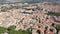 Scenic panoramic aerial view of residential areas of Narbonne with medieval Roman Catholic Cathedral on sunny summer day