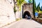 Scenic panoramic beltway road around lake Garda full of tunnels and galleries made in the rocks at the edge of a coastline