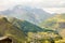 Scenic panoramic view of Kazbek mountain Georgia highest point and Gergeti Trinity Church at Stepantsminda village