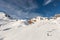 Scenic panoramic view of Silvretta ski area at Iscgl and Samnaun skiing resort with chairlifts , downhill slpoes and clear blue